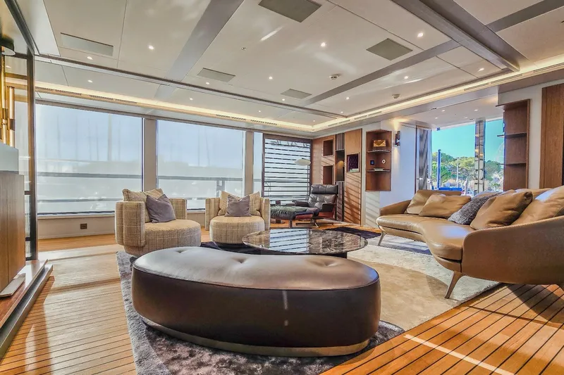  Yacht Photos Pics Luxurious yacht interior with modern furnishings, MMGI 44m, 2009 model, featuring elegant seating and decor.