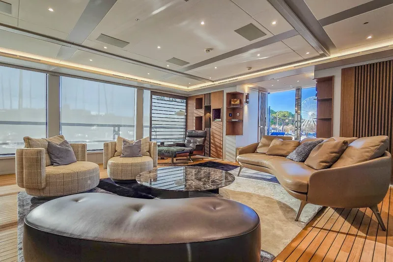  Yacht Photos Pics Luxurious yacht interior with modern seating, large windows, and elegant decor, MMGI 44m, 2009.