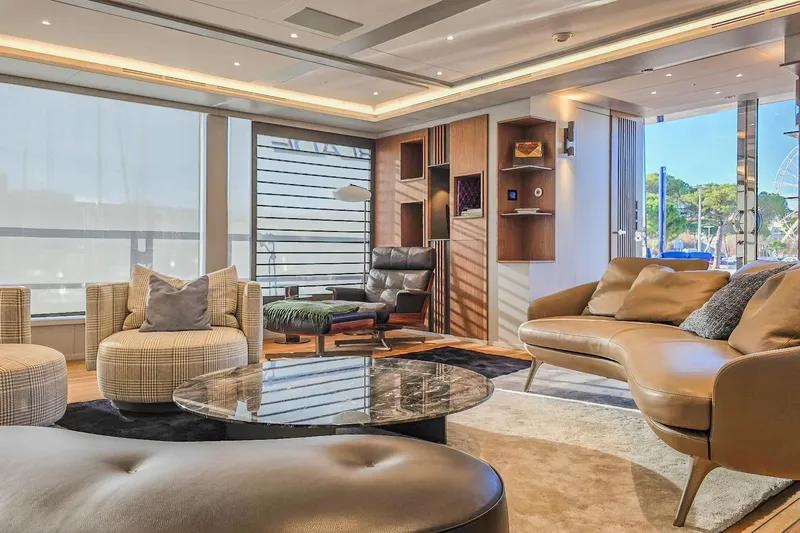  Yacht Photos Pics Luxurious yacht interior with modern furniture, large windows, and elegant decor, MMGI 44m, 2009.