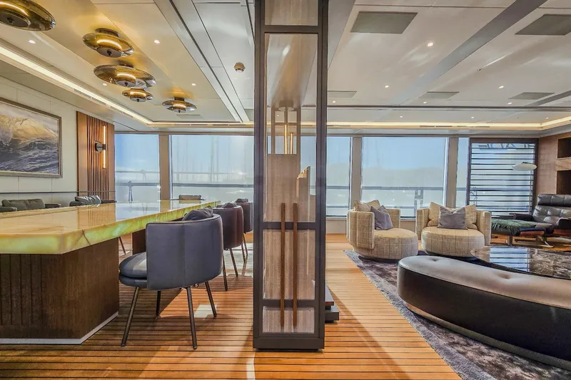  Yacht Photos Pics Luxurious yacht interior with modern seating, elegant lighting, and panoramic windows, MMGI 44m, 2009.