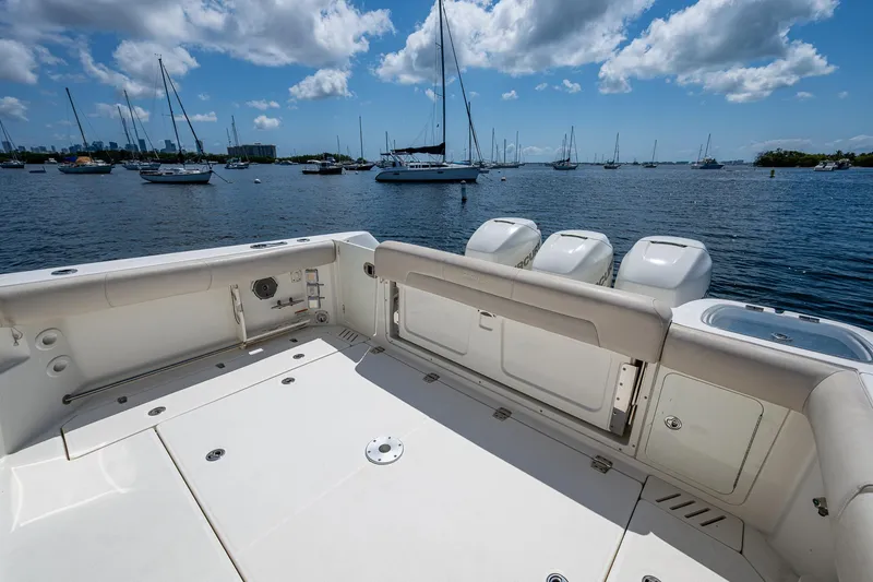  Yacht Photos Pics Boston Whaler 345 Conquest 2015 boat deck with ocean view and sailboats.