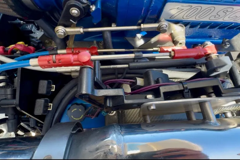 Jah Love Yacht Photos Pics Engine components of a 2015 Donzi 38 ZR boat, featuring detailed mechanical parts.