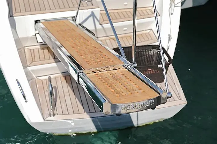 Masterdream Yacht Photos Pics Luxury yacht Lagoon 620 Esense 2018 with teak boarding platform over water.