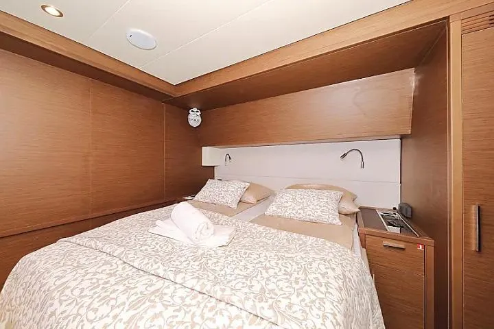 Masterdream Yacht Photos Pics Luxurious cabin interior of 2018 Lagoon 620 Esense yacht with elegant bedding.