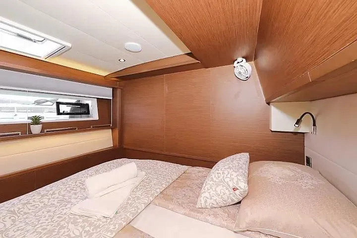 Masterdream Yacht Photos Pics Luxurious cabin interior of 2018 Lagoon 620 Esense yacht with elegant bedding.
