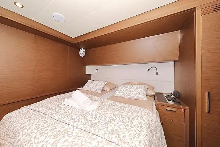 Masterdream Yacht Photos Pics Luxurious cabin interior of 2018 Lagoon 620 Esense yacht with elegant bedding.