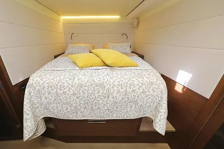 Masterdream Yacht Photos Pics Luxurious bedroom interior of 2018 Lagoon 620 Esense yacht with elegant bedding and ambient lighting.