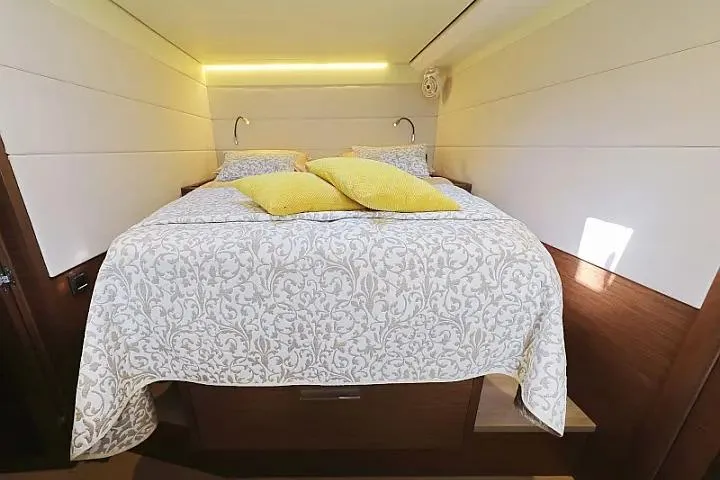 Masterdream Yacht Photos Pics Luxurious bedroom interior of 2018 Lagoon 620 Esense yacht with elegant bedding and ambient lighting.