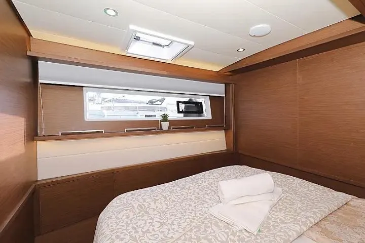 Masterdream Yacht Photos Pics Luxurious cabin interior of 2018 Lagoon 620 Esense yacht with elegant bedding.