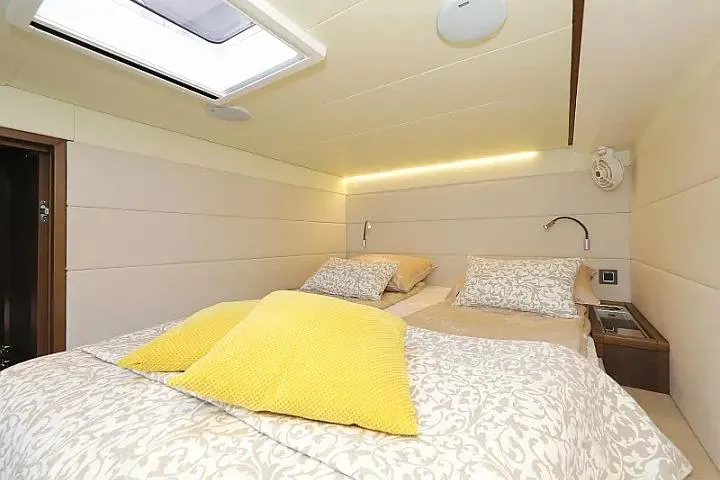 Masterdream Yacht Photos Pics Luxurious cabin interior of 2018 Lagoon 620 Esense yacht with cozy bedding.