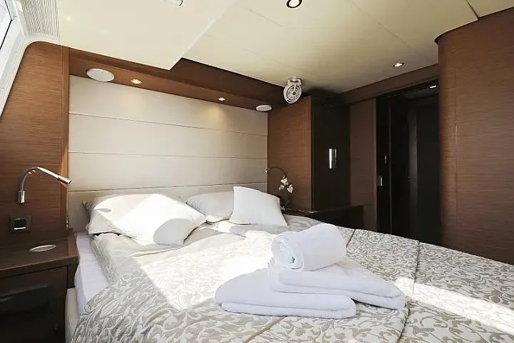 Masterdream Yacht Photos Pics Luxurious bedroom interior of 2018 Lagoon 620 Esense yacht with elegant bedding and modern lighting.