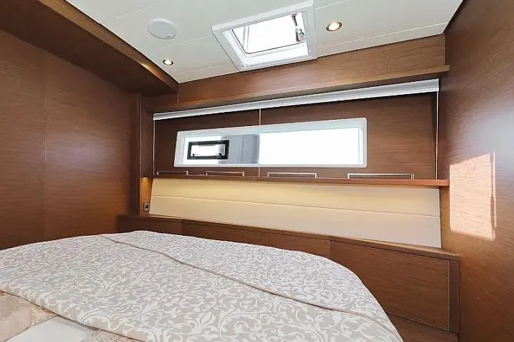 Masterdream Yacht Photos Pics Luxurious interior of 2018 Lagoon 620 Esense yacht cabin with elegant wood finish.