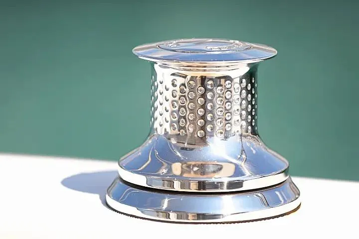 Masterdream Yacht Photos Pics Shiny winch on 2018 Lagoon 620 Esense yacht, close-up view.