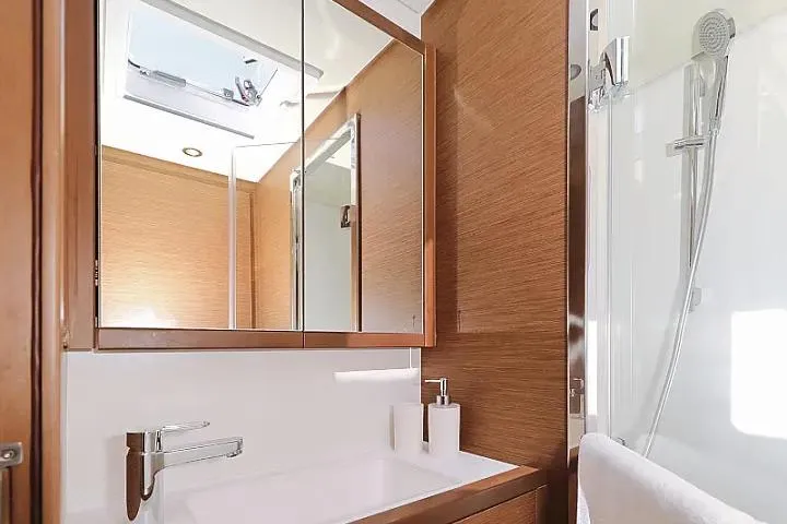 Masterdream Yacht Photos Pics Luxurious bathroom interior of 2018 Lagoon 620 Esense yacht with modern fixtures.