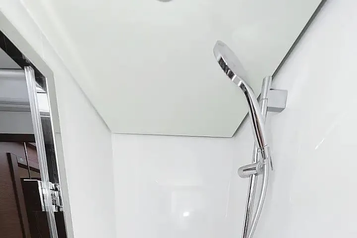 Masterdream Yacht Photos Pics Shower area in 2018 Lagoon 620 Esense yacht, featuring modern chrome fixtures.