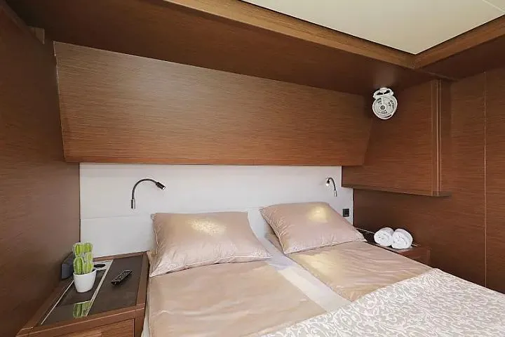 Masterdream Yacht Photos Pics Luxurious cabin interior of 2018 Lagoon 620 Esense yacht with elegant bedding.