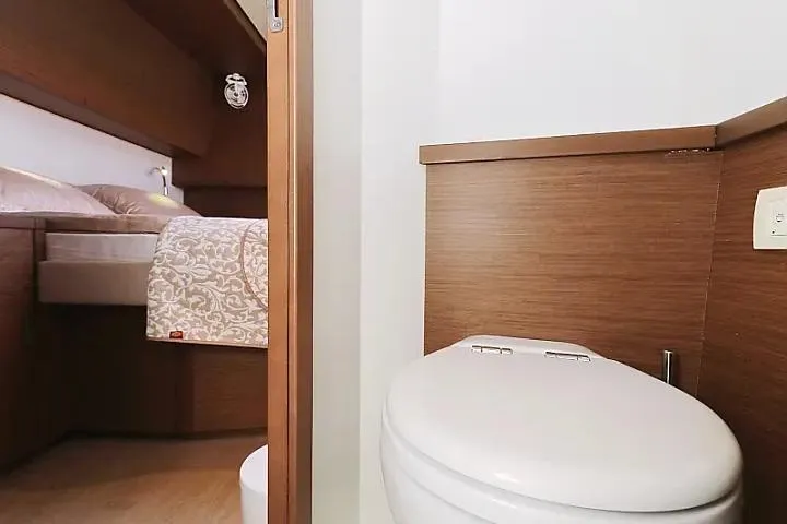 Masterdream Yacht Photos Pics Luxurious cabin interior of 2018 Lagoon 620 Esense yacht with modern bathroom.