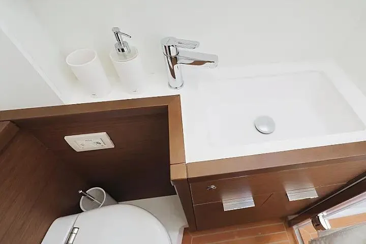 Masterdream Yacht Photos Pics Modern bathroom sink in 2018 Lagoon 620 Esense yacht, featuring sleek design and fixtures.