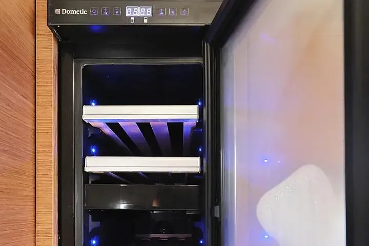 Masterdream Yacht Photos Pics Dometic fridge interior with blue LED lights on Lagoon 620 Esense, 2018 model.