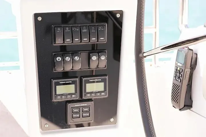 Masterdream Yacht Photos Pics Control panel on 2018 Lagoon 620 Esense yacht with switches and digital displays.