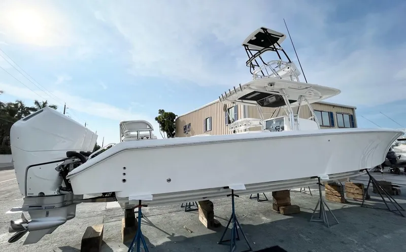Our Trade Yacht Photos Pics 2014 Bahama 41 Center Console boat on stands, side view.