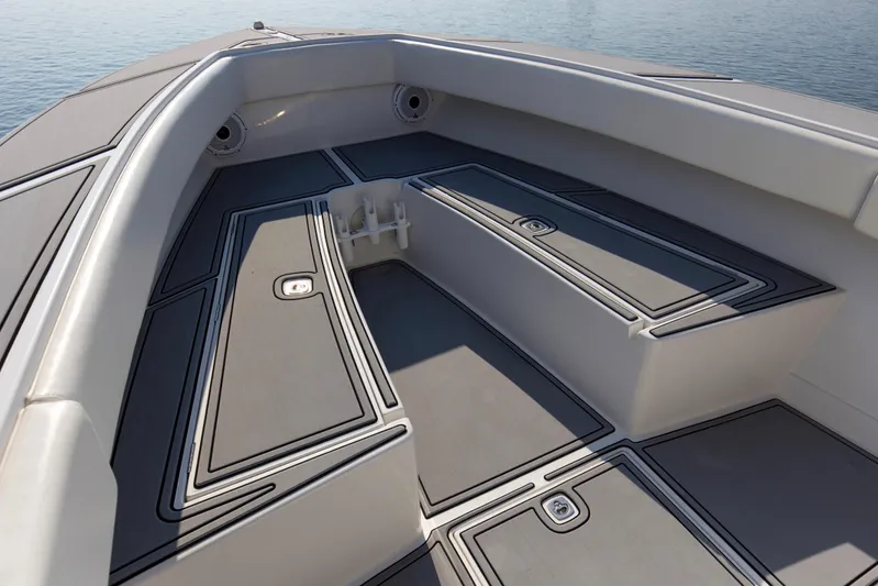 Smoke Show Yacht Photos Pics 2004 Jupiter 31 FS boat interior with sleek storage compartments and seating.