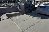 Luxurious 2023 Absolute 60 Fly yacht with spacious sunbathing area and modern seating.