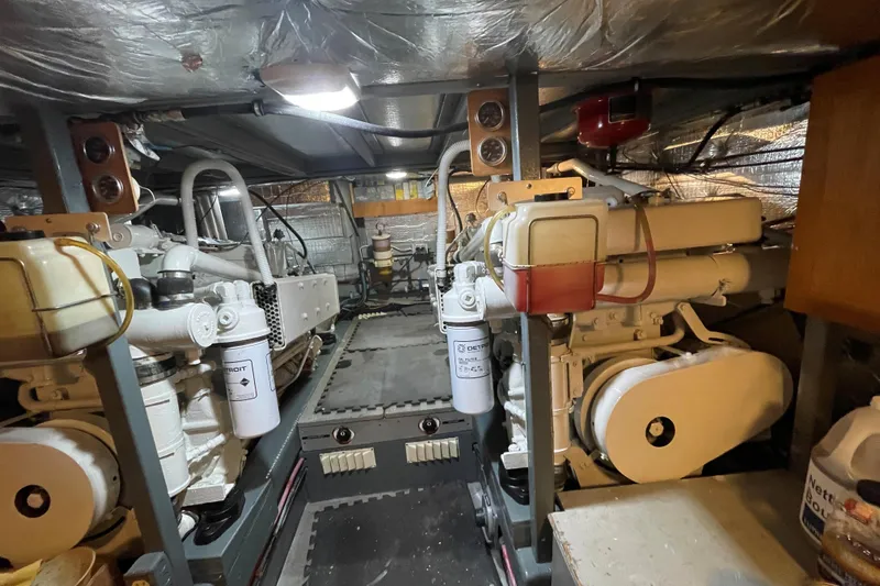  Yacht Photos Pics Engine room of 1980 Tollycraft 48 Cockpit Motor Yacht with visible machinery and equipment.