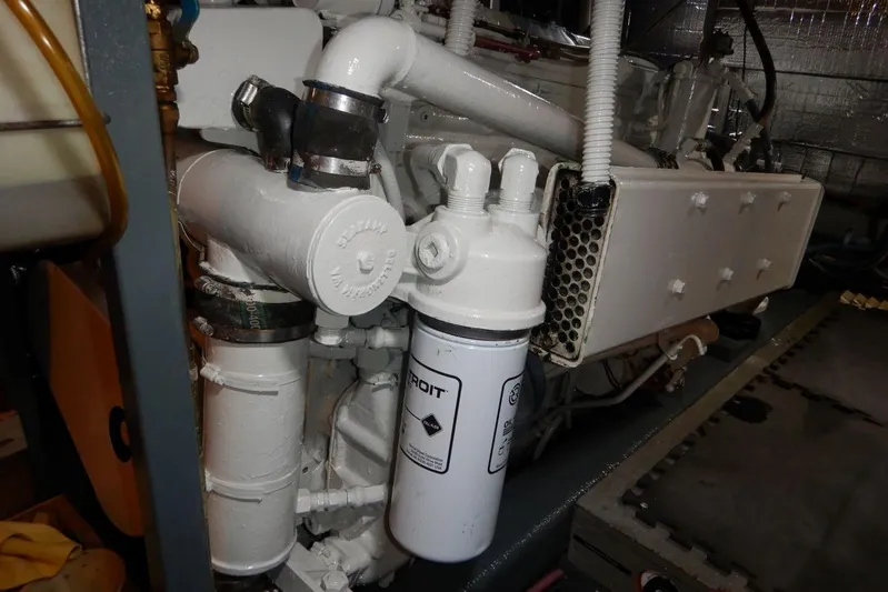  Yacht Photos Pics Engine room of 1980 Tollycraft 48 Cockpit Motor Yacht, featuring mechanical components.