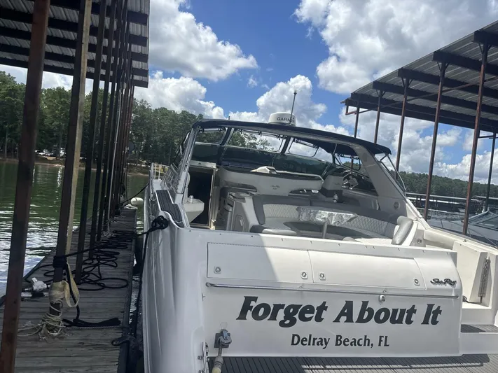 Forget About It Yacht Photos Pics 1996 Sea Ray 500 Sundancer docked at Delray Beach, FL, under a clear sky.