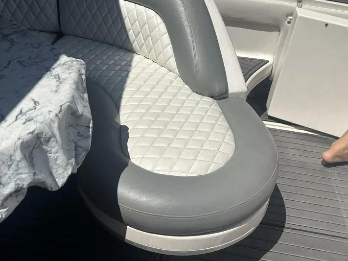 Forget About It Yacht Photos Pics Luxurious seating on a 1996 Sea Ray 500 Sundancer yacht with quilted upholstery.