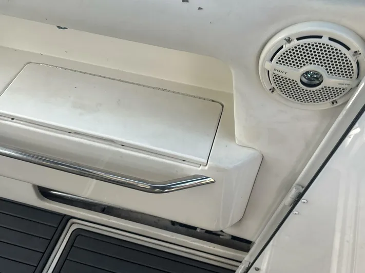 Forget About It Yacht Photos Pics 1996 Sea Ray 500 Sundancer interior with Sony speaker and sleek design elements.