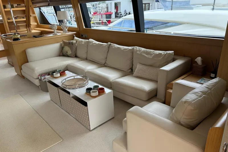  Yacht Photos Pics Luxurious interior of 2014 Ferretti Yachts 800 with elegant beige seating and modern decor.