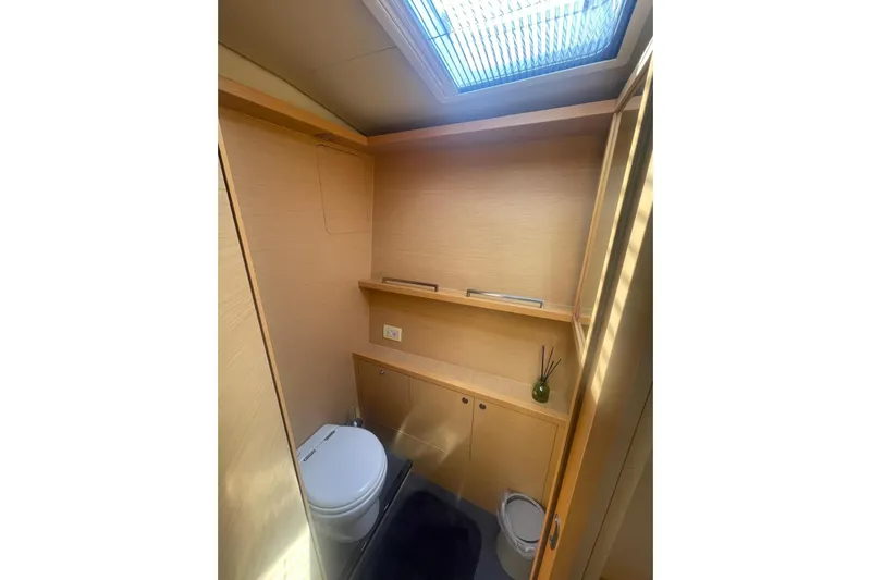  Yacht Photos Pics Modern bathroom interior of 2015 Lagoon 560 S2 yacht with skylight.