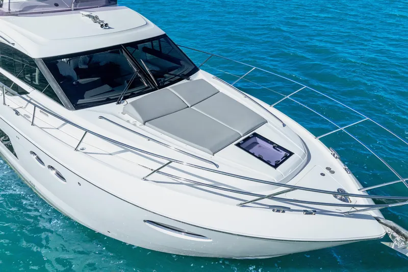 Chill Yacht Photos Pics 2018 Princess F49 yacht cruising on clear blue water.