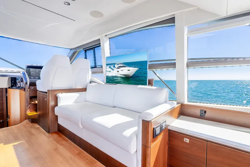 Chill Yacht Photos Pics Luxurious interior of 2018 Princess F49 yacht with ocean view and modern furnishings.