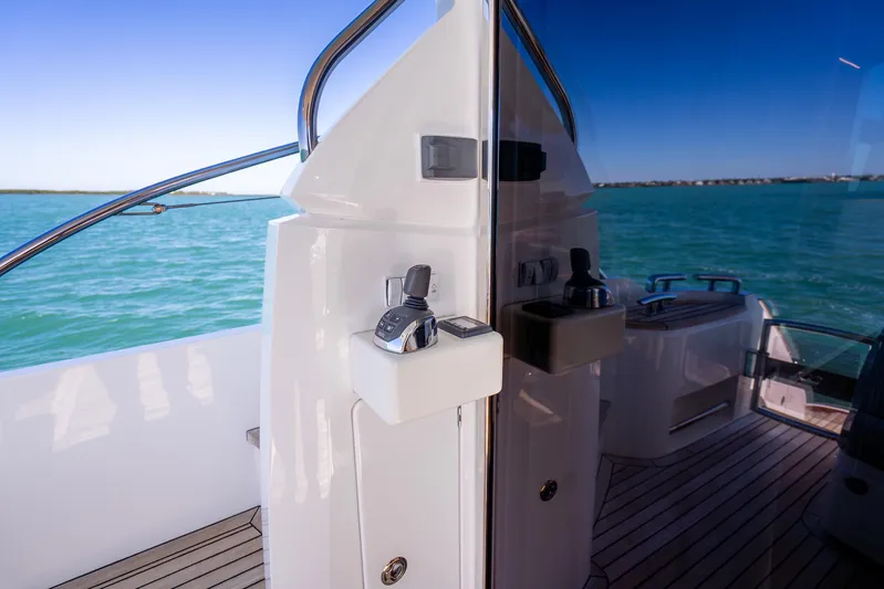 Chill Yacht Photos Pics 2018 Princess F49 yacht deck with ocean view and modern controls.