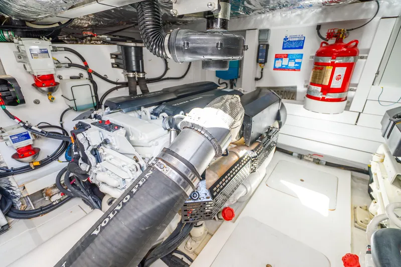 Chill Yacht Photos Pics Engine room of 2018 Princess F49 yacht with Volvo Penta engine and safety equipment.