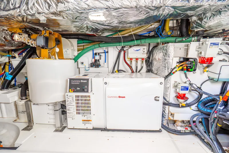 Chill Yacht Photos Pics Engine room of 2018 Princess F49 yacht with Cummins Onan generator and wiring.