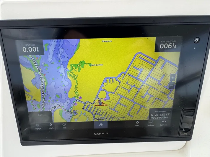  Yacht Photos Pics Garmin navigation display on 1999 Cabo 45 Express boat showing detailed marine map.