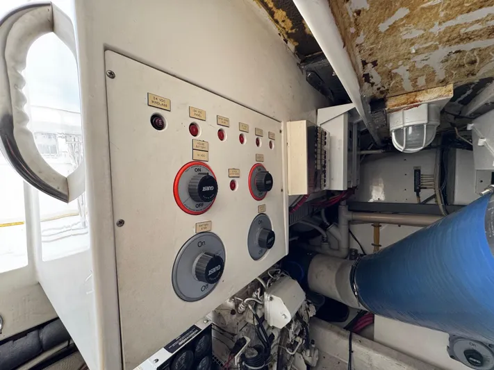  Yacht Photos Pics Control panel of a 1999 Cabo 45 Express boat engine room.