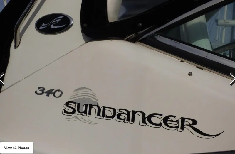  Yacht Photos Pics 2007 Sea Ray 340 Sundancer boat exterior with logo and model name.