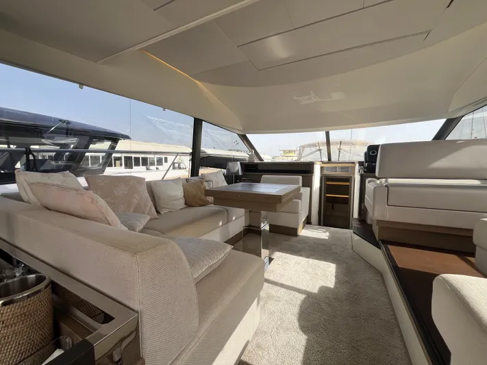  Yacht Photos Pics Luxurious interior of a 2018 Prestige 520 yacht with elegant seating and modern design.