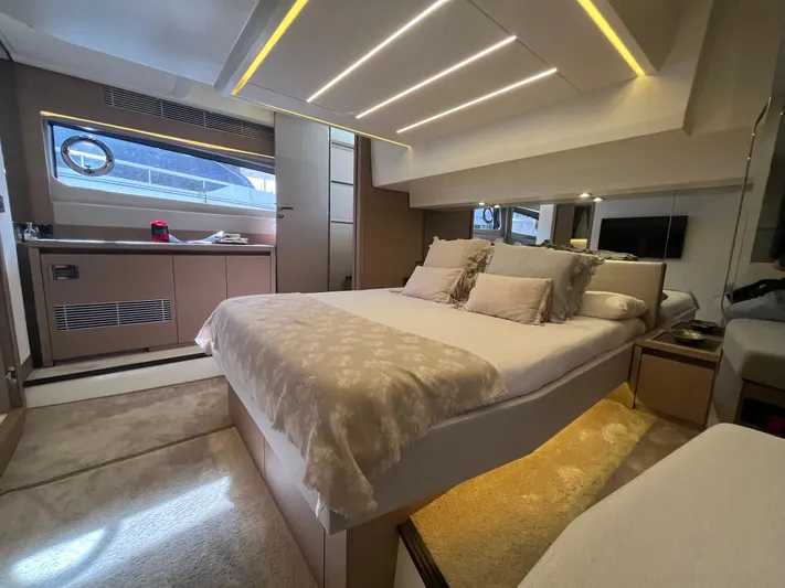  Yacht Photos Pics Luxurious interior of a 2018 Prestige 520 yacht with elegant bedroom design.