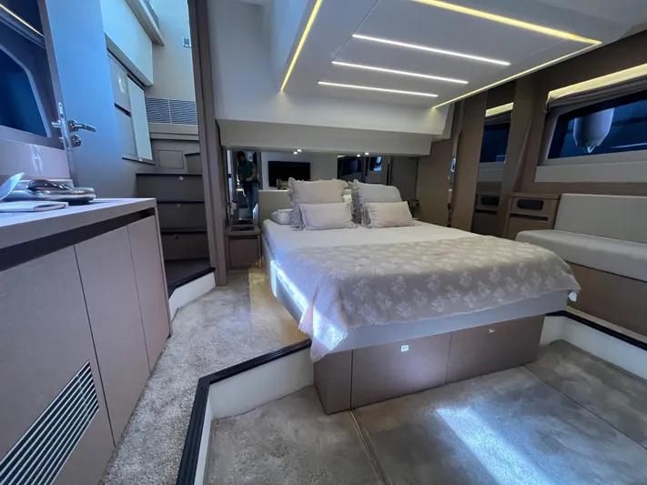  Yacht Photos Pics Luxurious interior of a 2018 Prestige 520 yacht with modern bedroom design.