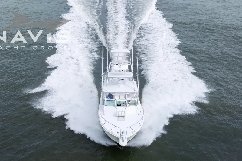 Pipe Dream Yacht Photos Pics Aerial view of 2005 Topaz 32 Express yacht cruising on open water.