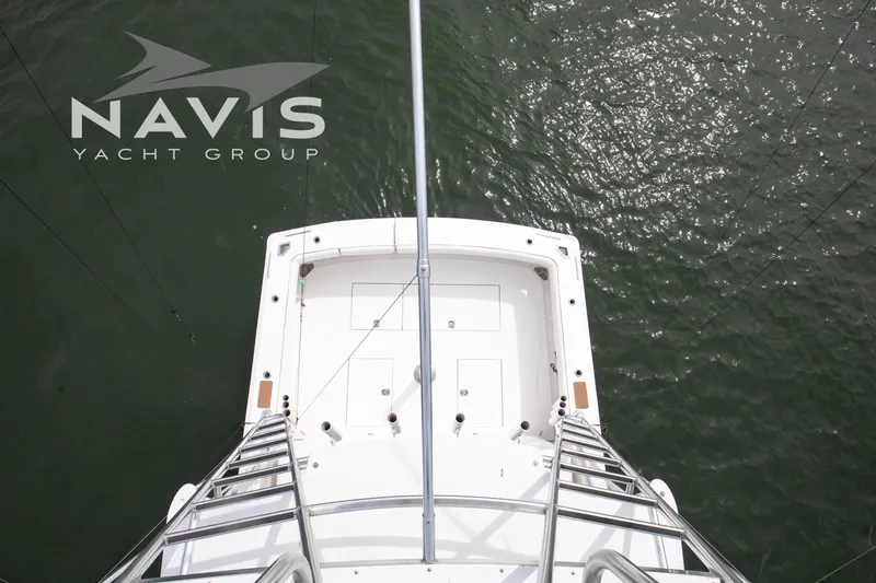 Pipe Dream Yacht Photos Pics Top view of 2005 Topaz 32 Express yacht by Navis Yacht Group on water.