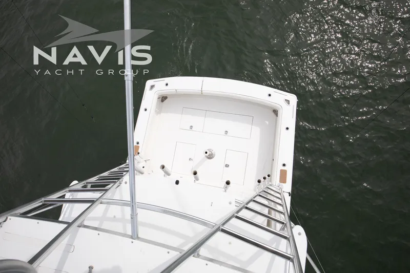 Pipe Dream Yacht Photos Pics Aerial view of 2005 Topaz 32 Express yacht deck on water.