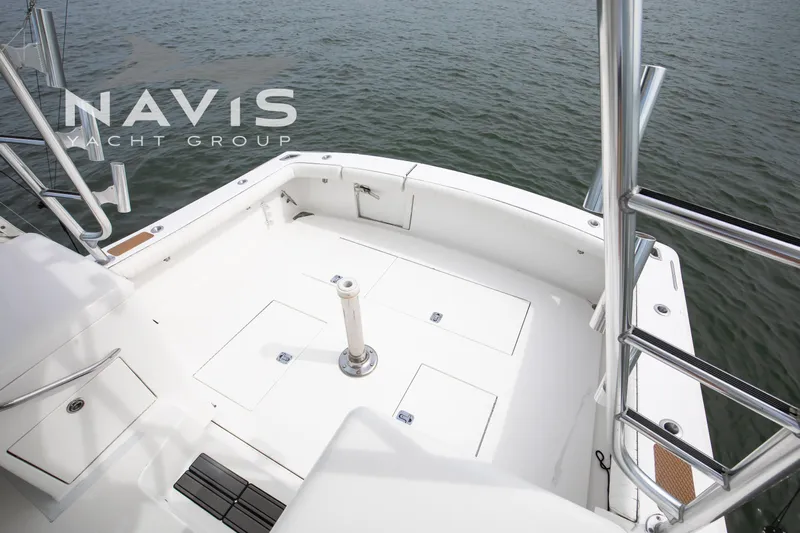 Pipe Dream Yacht Photos Pics 2005 Topaz 32 Express yacht deck with ocean view and sleek design.