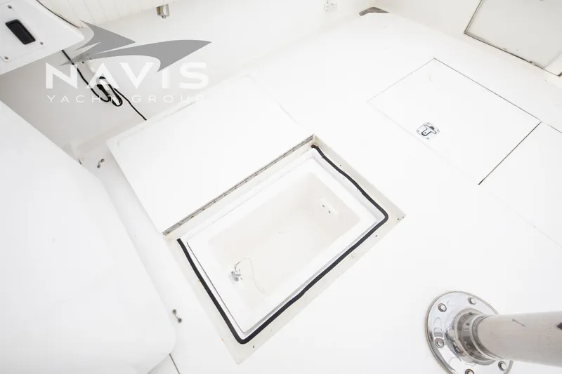 Pipe Dream Yacht Photos Pics 2005 Topaz 32 Express yacht deck with storage compartments and stainless steel fittings.